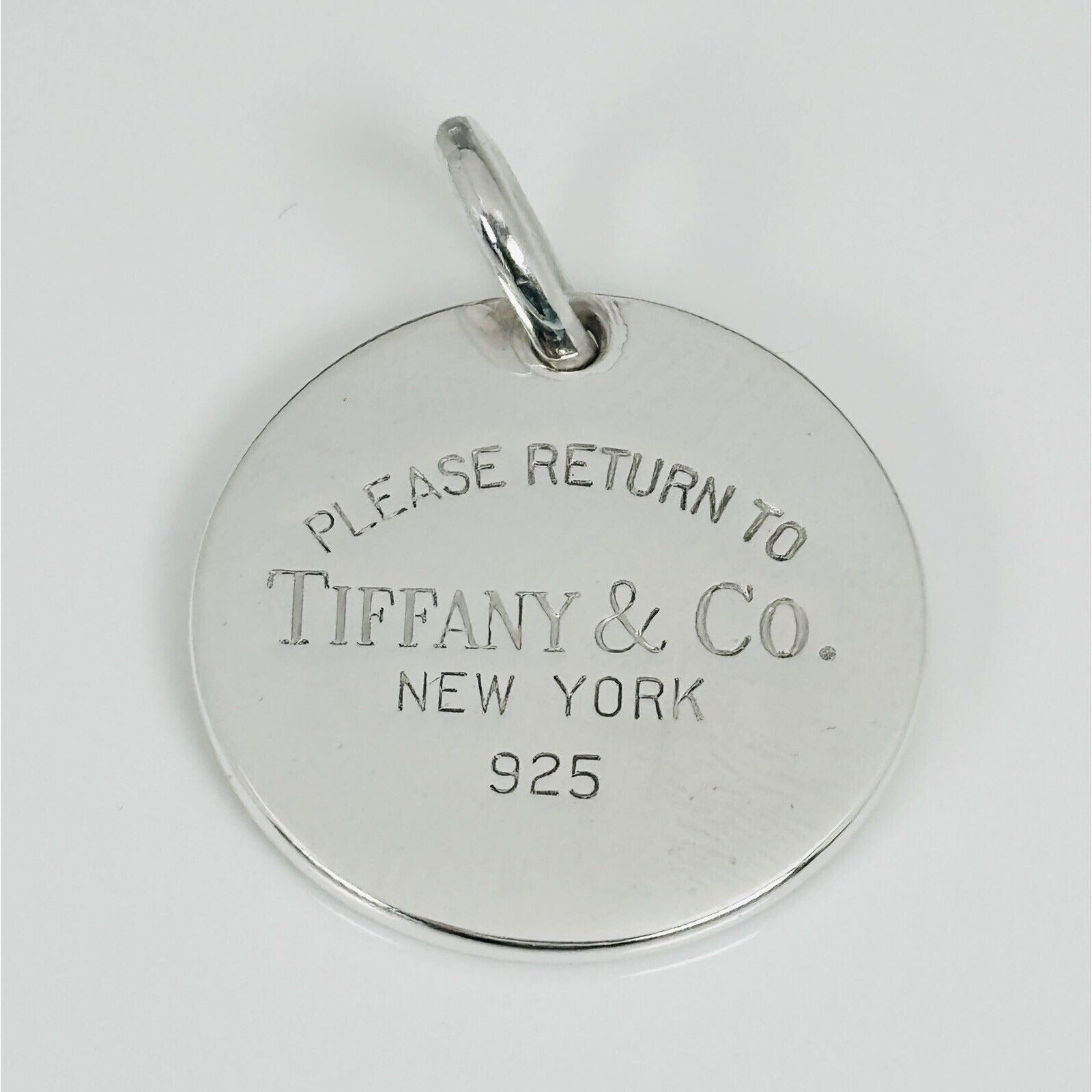 Return to Tiffany Round Tag Pendant or Charm in Sterling Silver