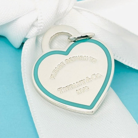 Return to Tiffany & Co Blue Enamel Border Heart Tag charm or Pendant in Silver