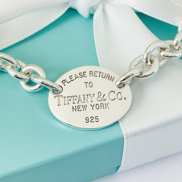 7.75” Please Return To Tiffany Oval Tag Charm Bracelet in Silver