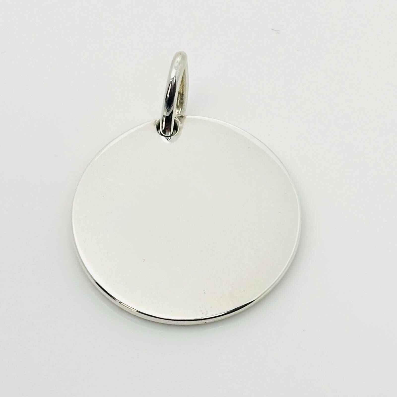 Return to Tiffany Round Tag Pendant or Charm in Sterling Silver