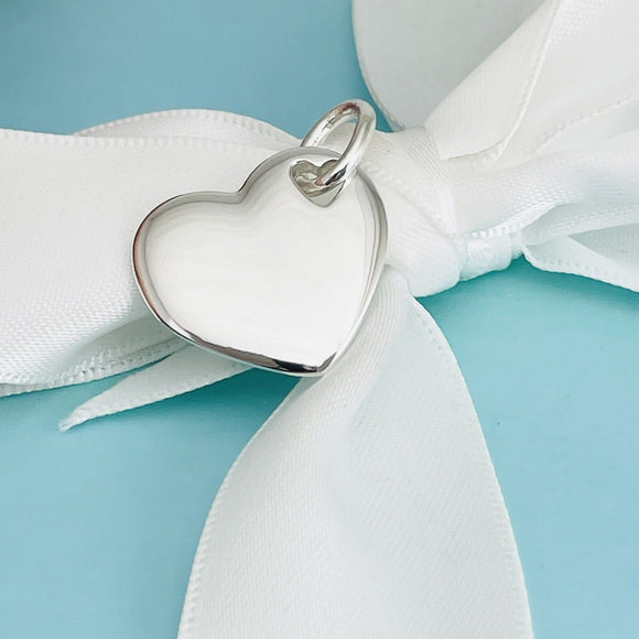 Tiffany & Co Double Puffed Heart Pendant Charm Cutout in Sterling Silver