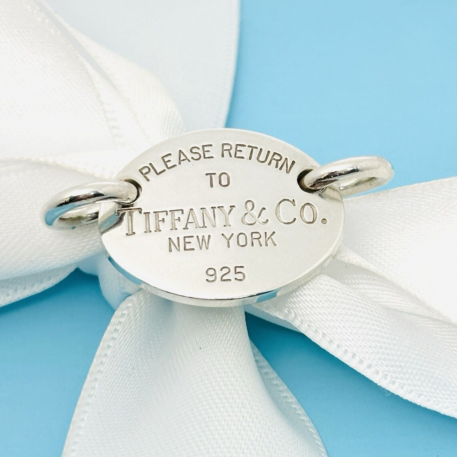 Please Return to Tiffany & Co Sterling Silver Oval Tag Pendant From Choker