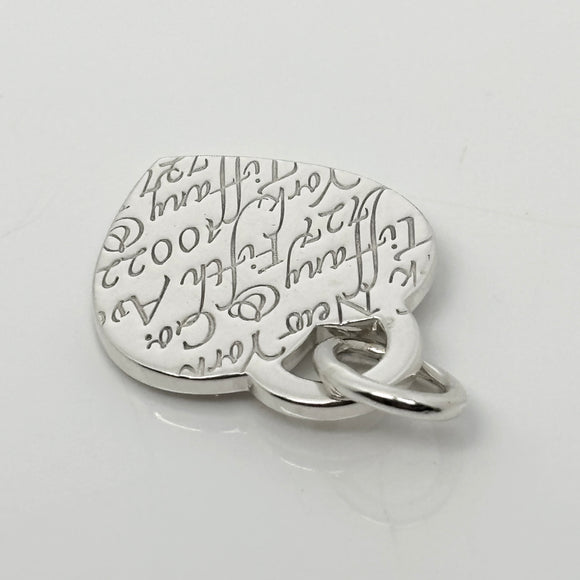 Tiffany & Co Notes 727 Fifth Ave Wave Heart Pendant or Charm in Sterling Silver