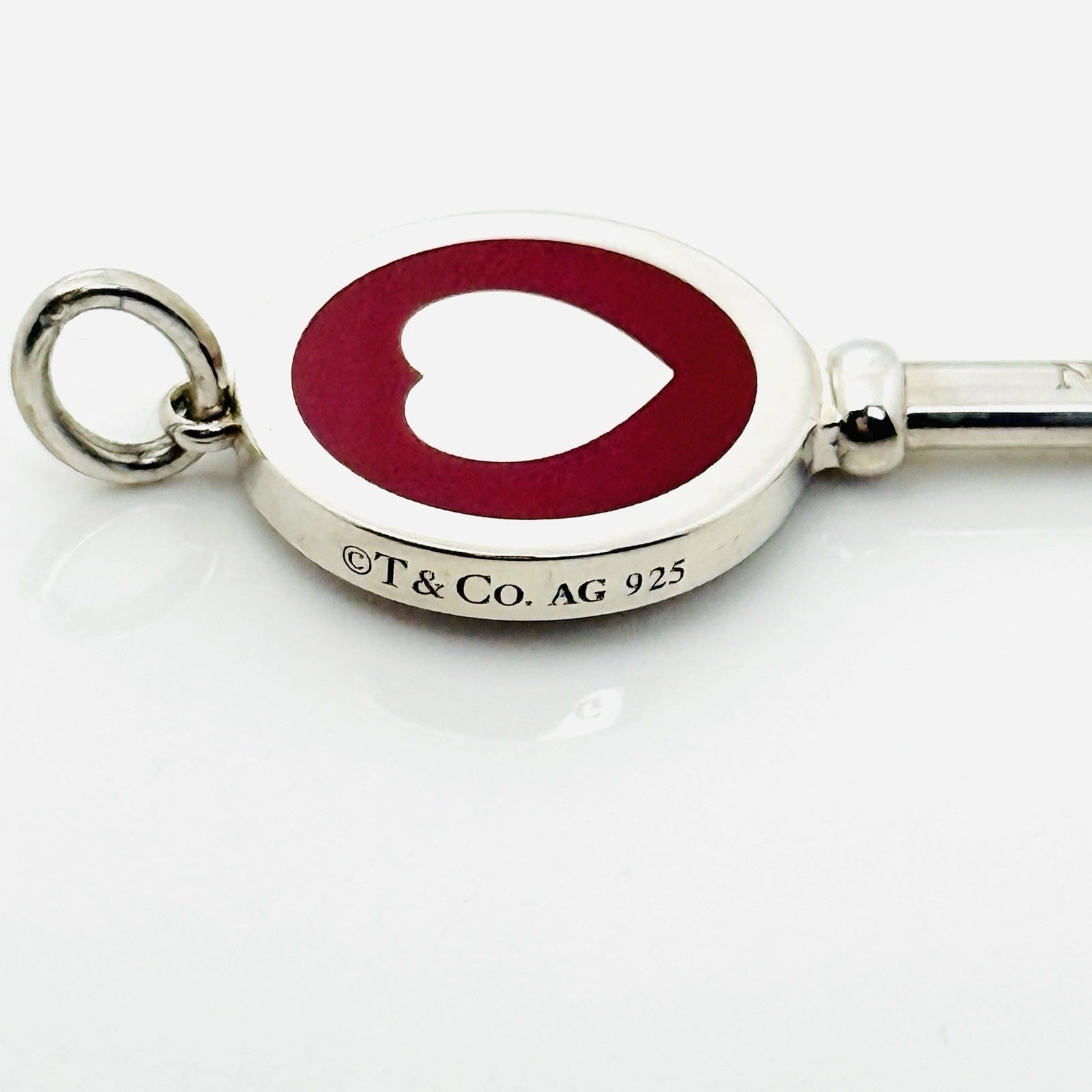Tiffany & Co Red Enamel Heart Key Pendant in Sterling Silver