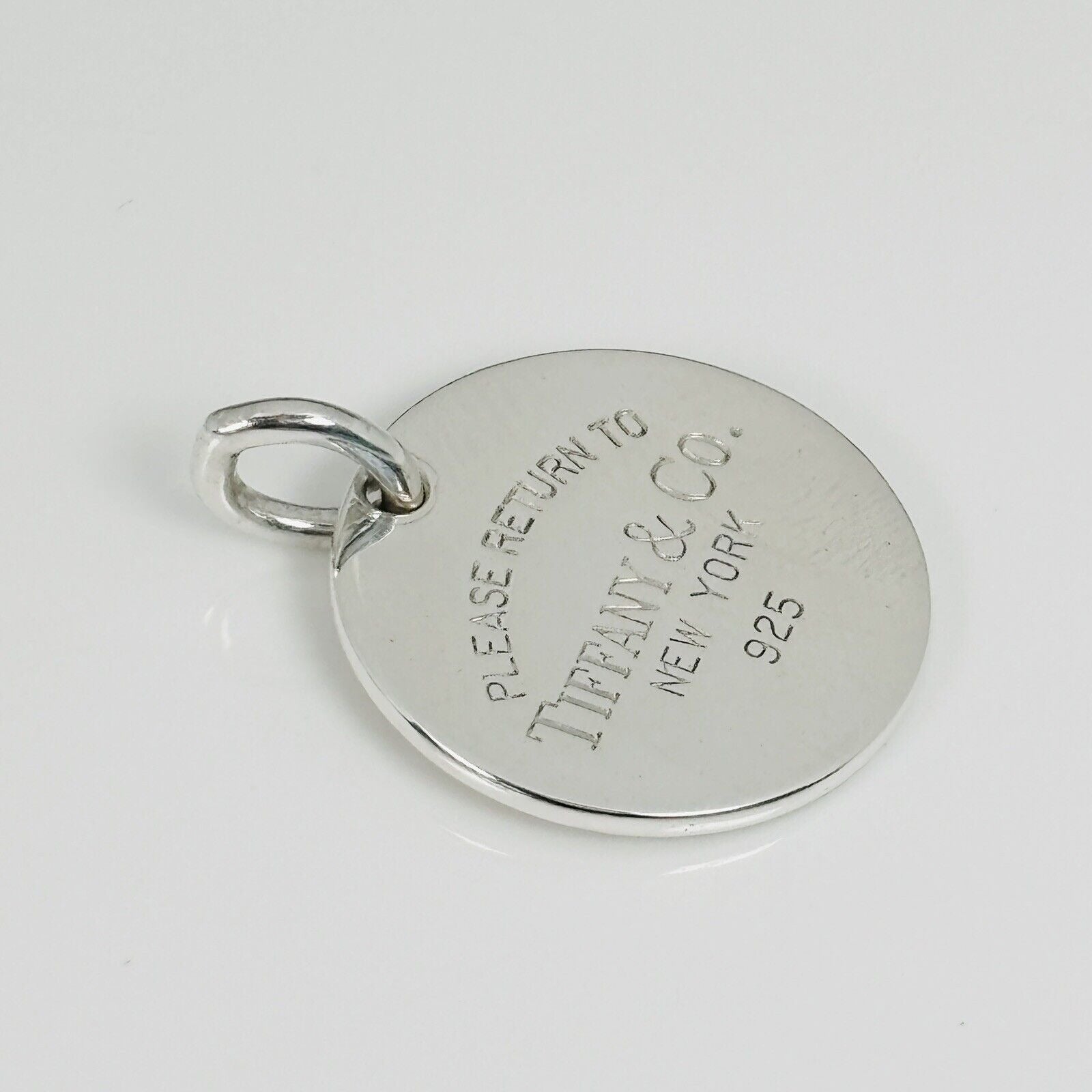 Return to Tiffany Round Tag Pendant or Charm in Sterling Silver