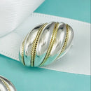 1 Single Tiffany Shell Dome Earring in Silver and Yellow Gold Twist-1