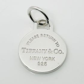 Please Return to Tiffany & Co Silver Round Tag Circle Charm or Pendant in Silver