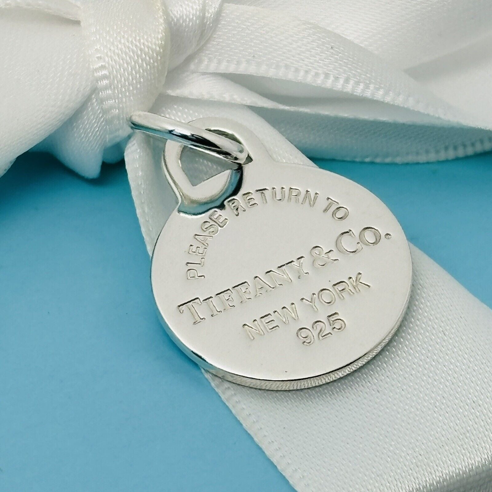 Please Return to Tiffany & Co Silver Round Tag Circle Charm or Pendant in Silver