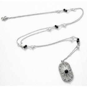 36" Tiffany & Co. Ziegfeld Pearl and Black Onyx Oval Pendant Necklace