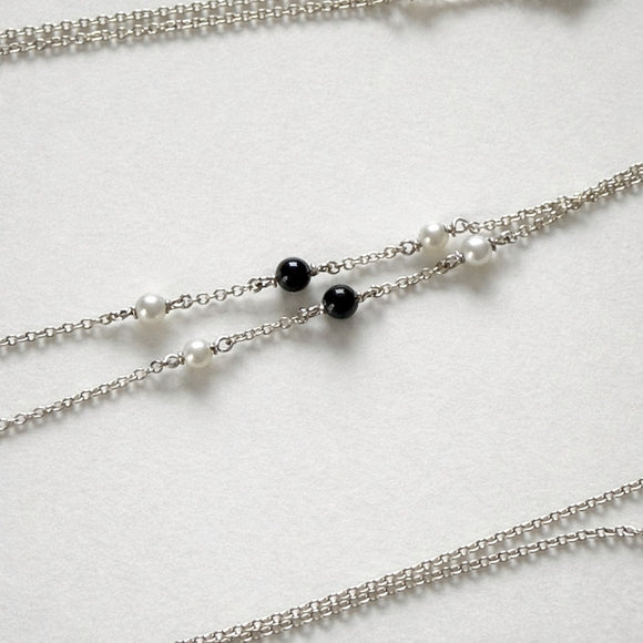 36" Tiffany & Co. Ziegfeld Pearl and Black Onyx Oval Pendant Necklace