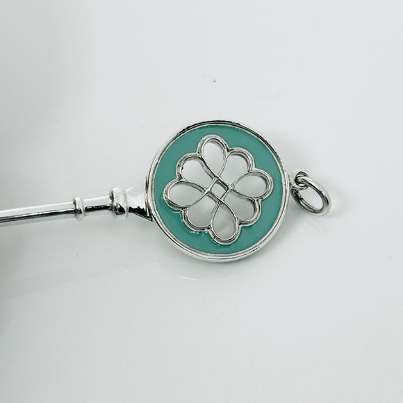 Tiffany & Co Blue Enamel Round Quatrefoil Daisy Flower Key Pendant in Silver