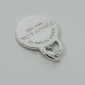 Please Return to Tiffany & Co Silver Round Tag Circle Charm or Pendant in Silver - 0