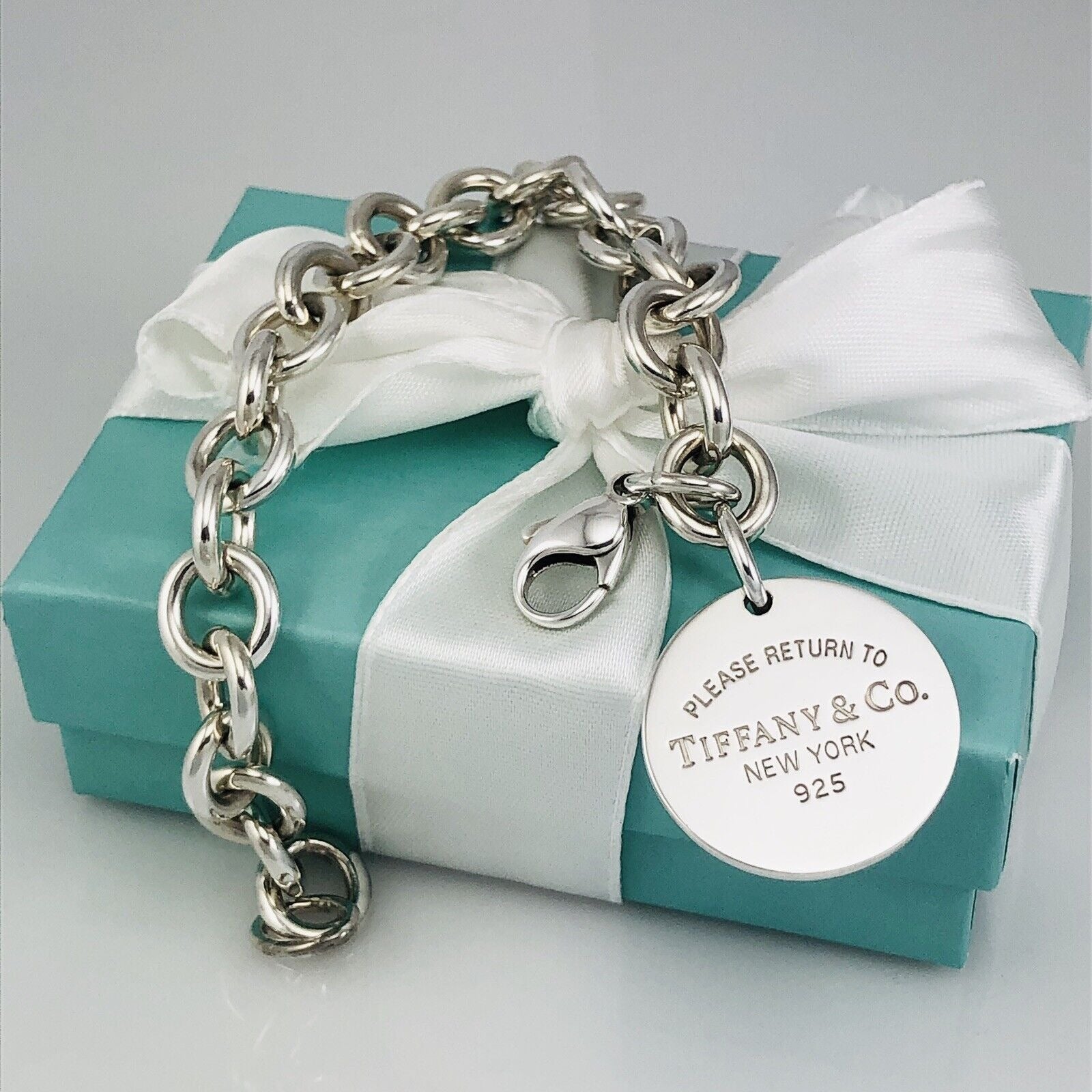7.5" Medium Please Return to Tiffany & Co Round Tag Charm Bracelet in Silver