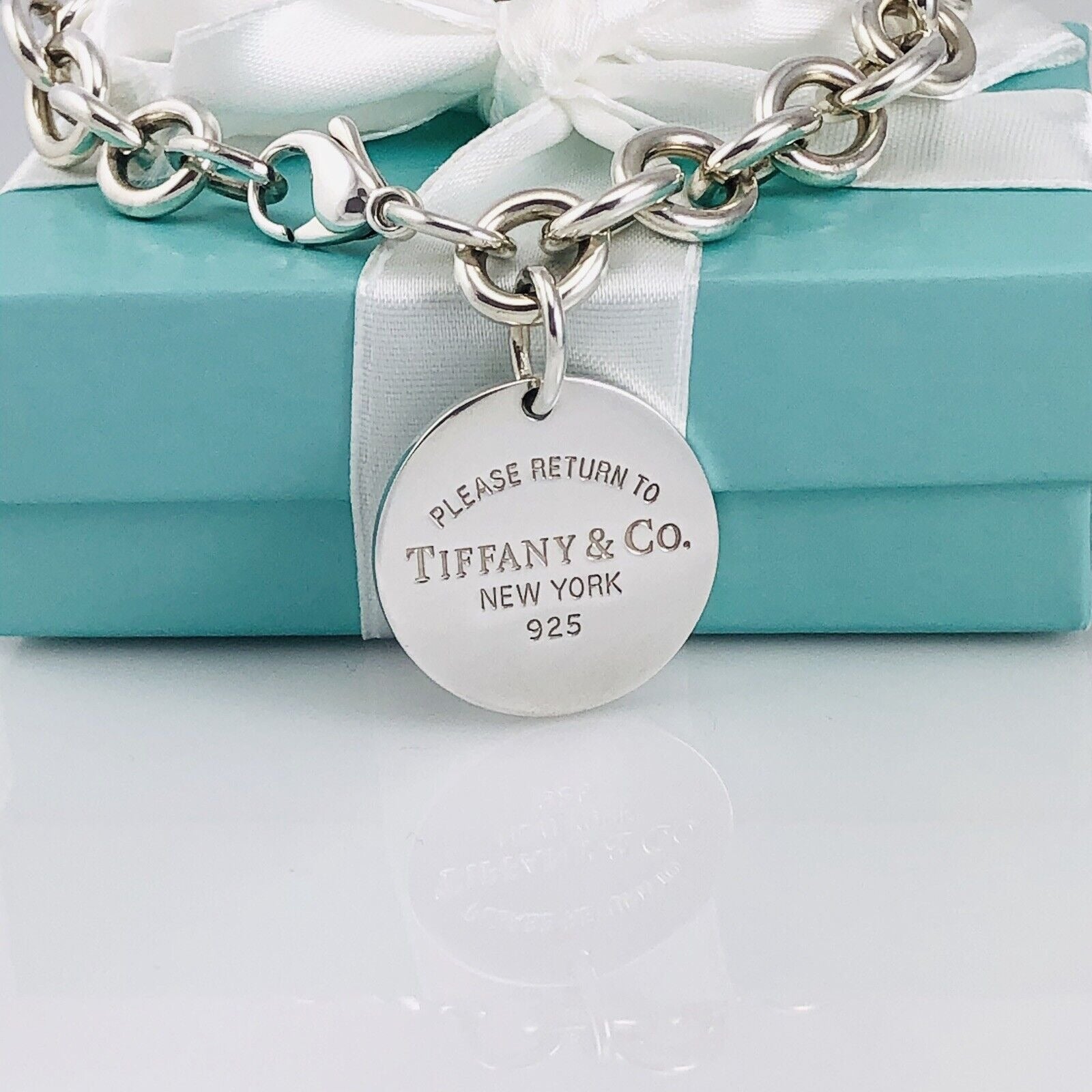 7.5" Medium Please Return to Tiffany & Co Round Tag Charm Bracelet in Silver