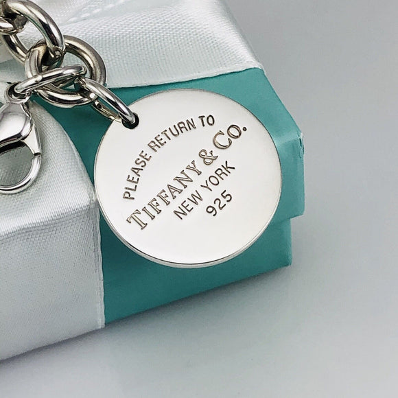 7.5" Medium Please Return to Tiffany & Co Round Tag Charm Bracelet in Silver