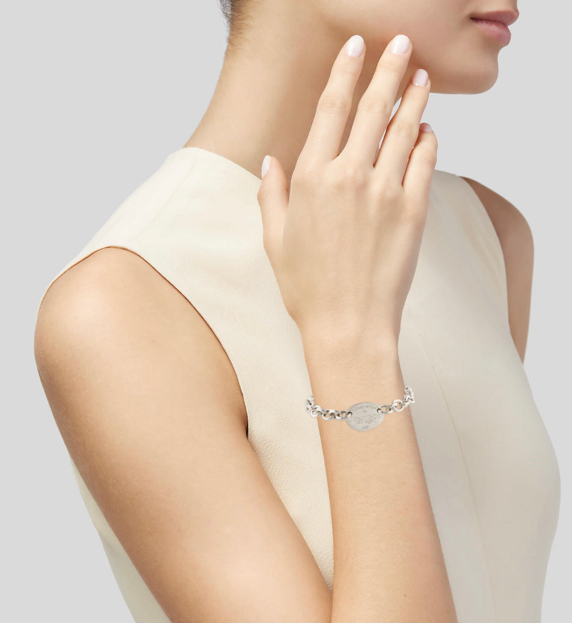 Please Return To Tiffany & Co Oval Tag Charm Bracelet in Silver