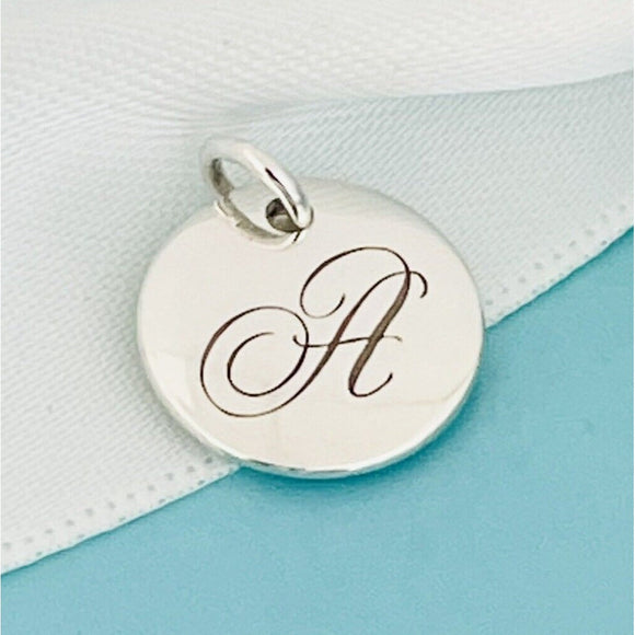 Tiffany & Co. Letter U Notes Alphabet Initial Charm Disc Round Pendant